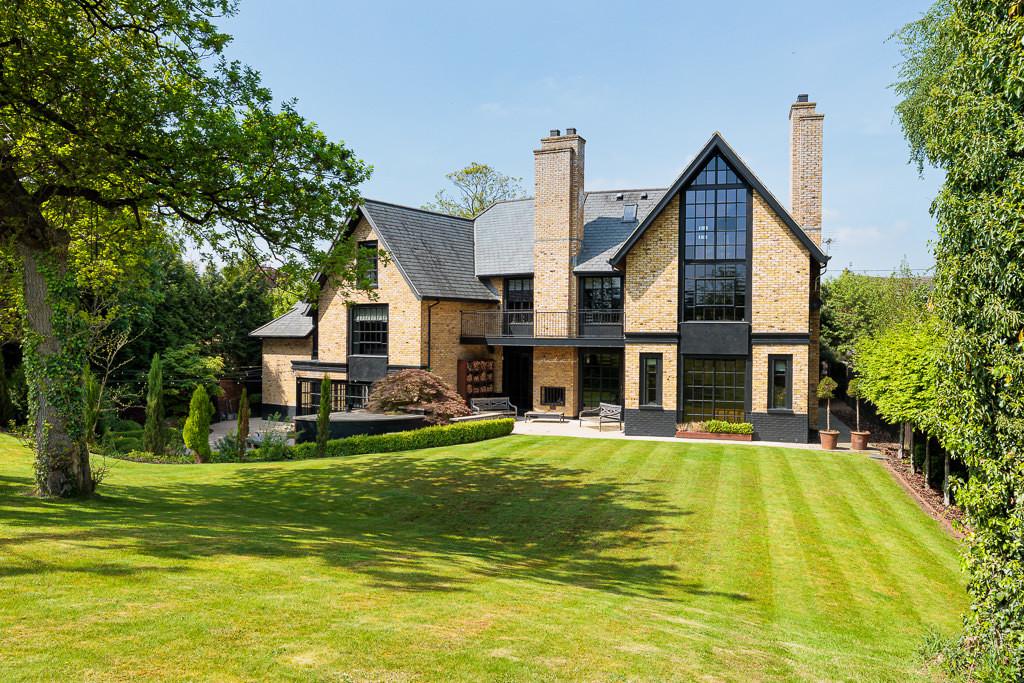 The Ponds — rear exterior view showing contemporary architecture with south-facing landscaped gardens