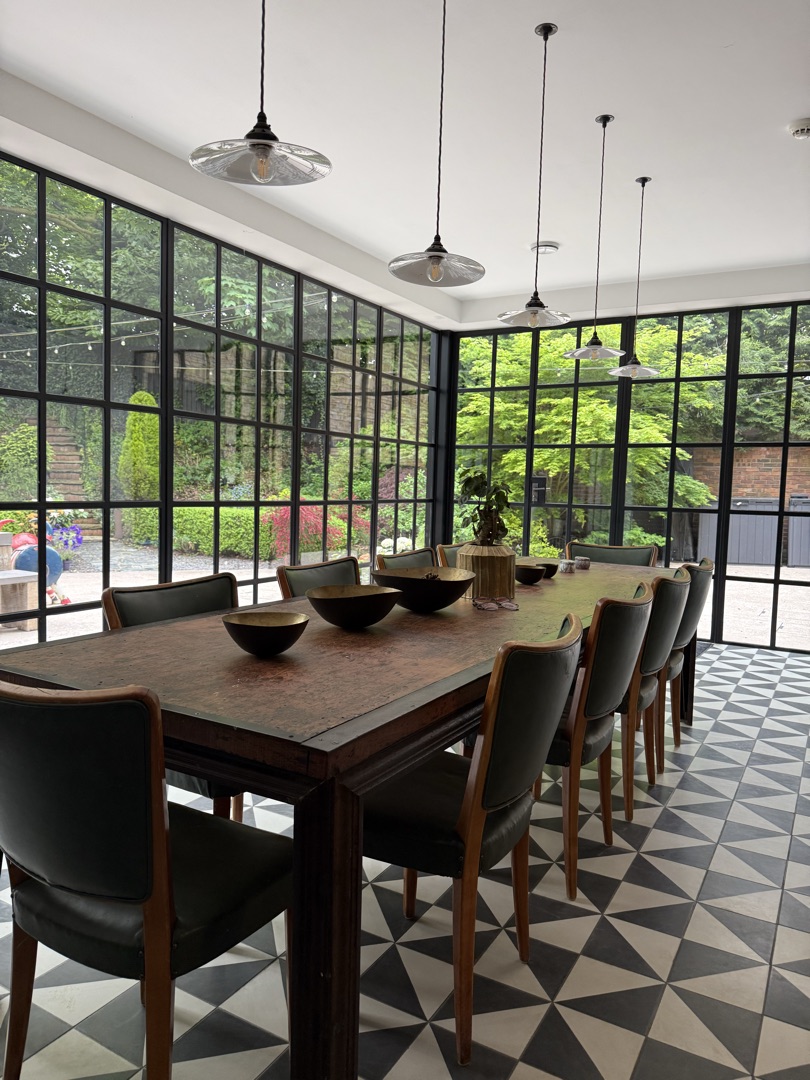 Dining room with Crittall glazing and garden views
